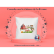 Coussin avec une composition sur le thème de la ferme